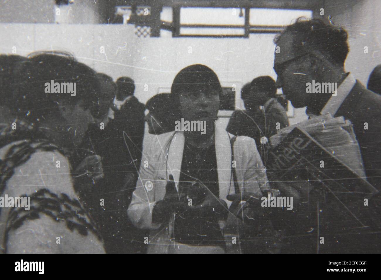 Fine 1970s vintage black and white photography of adults discussing ...