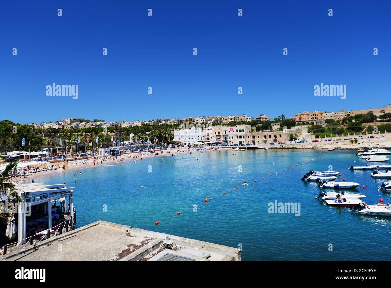 The vibrant beach of St Bay in St Julian