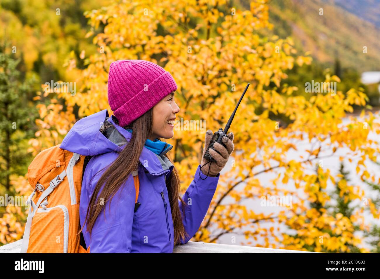 Ham radio gear outdoor hiking girl talking Stock Photo