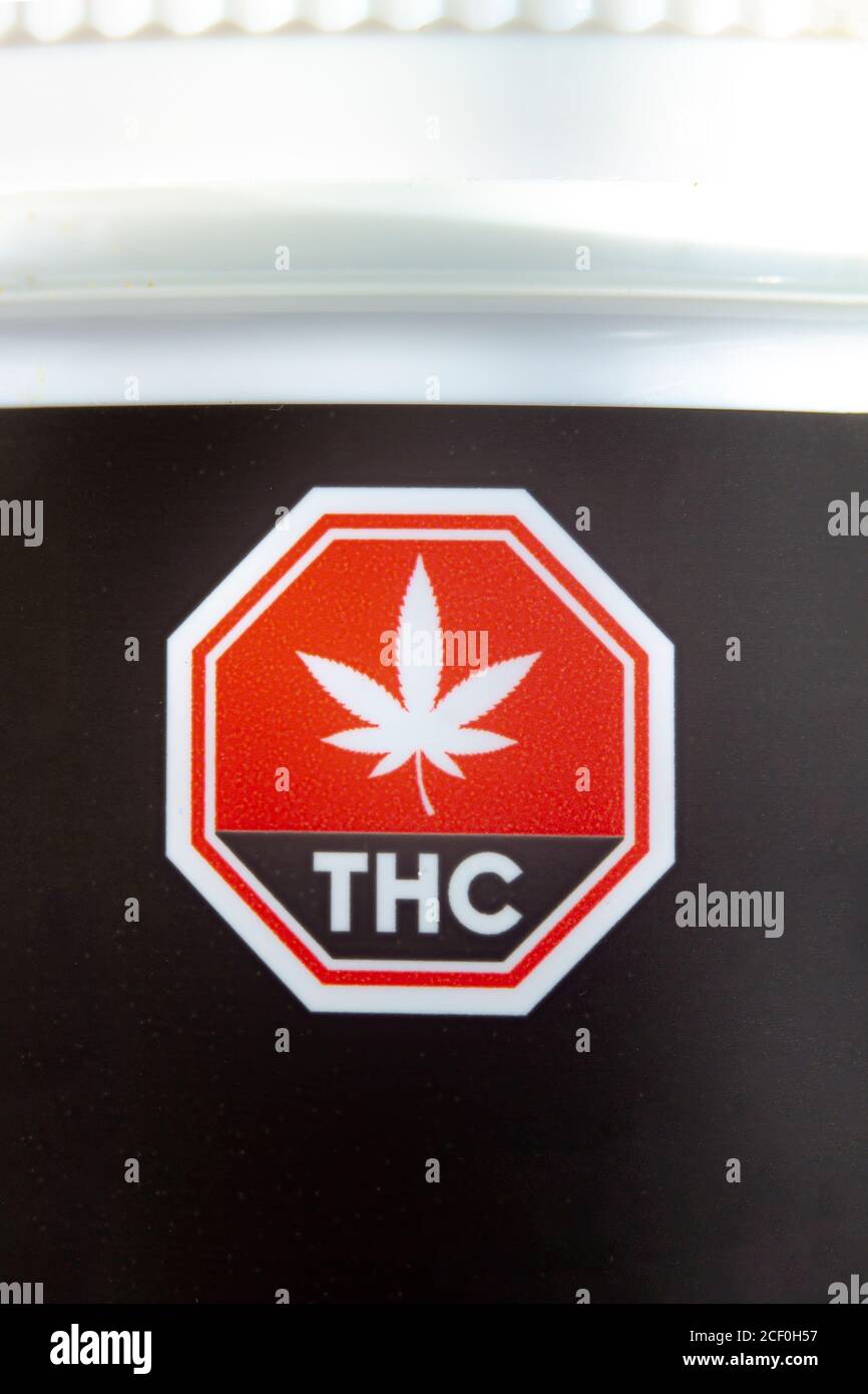 Calgary, Alberta, Canada. Sep 02, 2020. Macro close up of the Standardized Cannabis Symbol on black cannabis container. Stock Photo