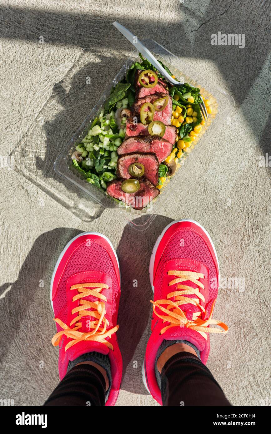 Gym foot paleo diet prepared meal fitness woman Stock Photo