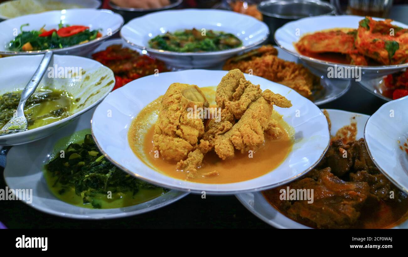 Various menu of Padang Restaurant, Indonesian food Stock Photo - Alamy
