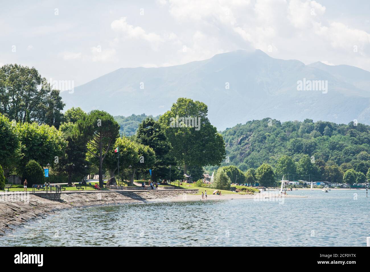 Colico. Lake Como. Italy - July 21, 2019: Embankment of Colico City. Como Lake. Italy. Relaxing Tourists and Camping Territory. Stock Photo