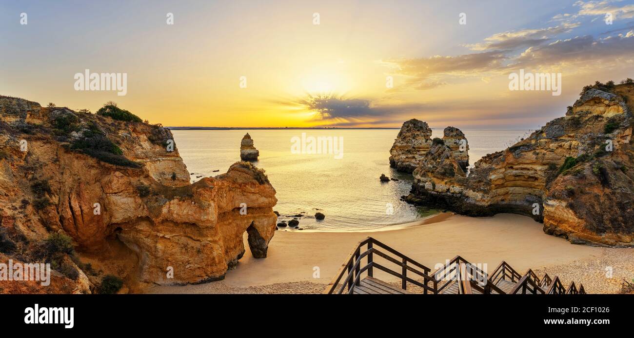 View of Camilo beach and staircase,at sunrise, Algarve, Portugal Stock Photo