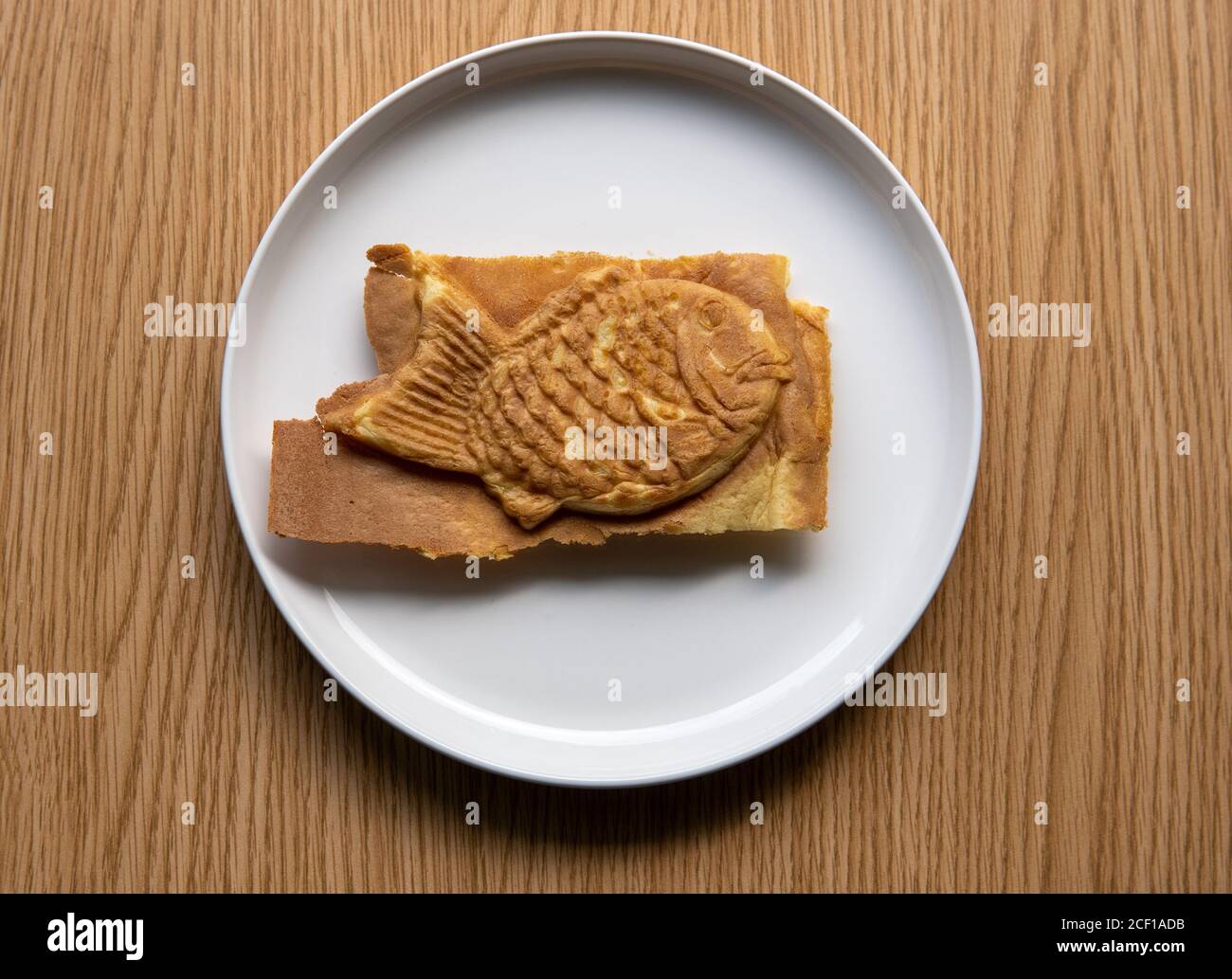 Taiyaki is a Japanese filled pastry. Battered waffle like fish shaped sweet snack food treat