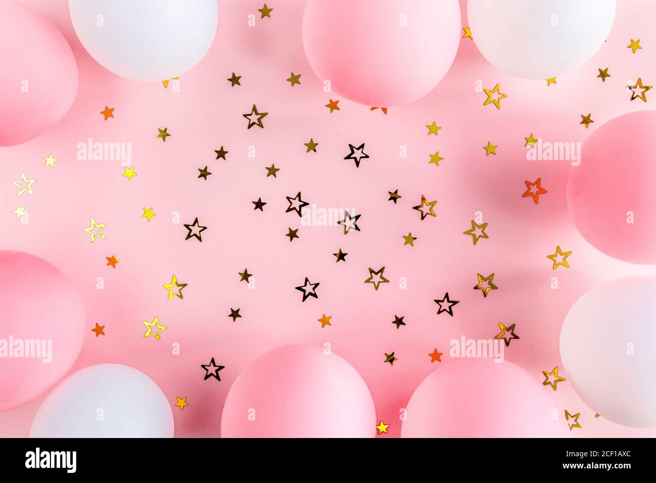 Frame from Balloons and confetti on pink background. Valentines day,  Birthday, holiday concept. Flat lay, top view Stock Photo - Alamy