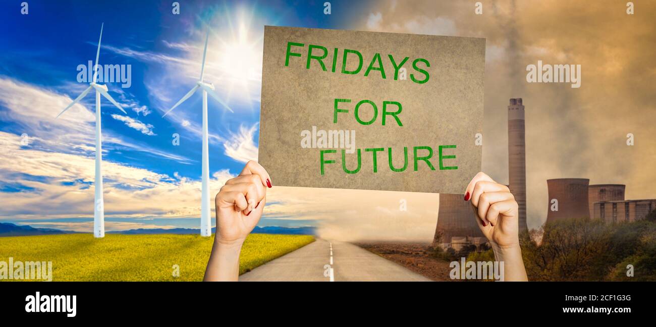 hands hold up a poster with the inscription fridays for future in front of an abstract background Stock Photo