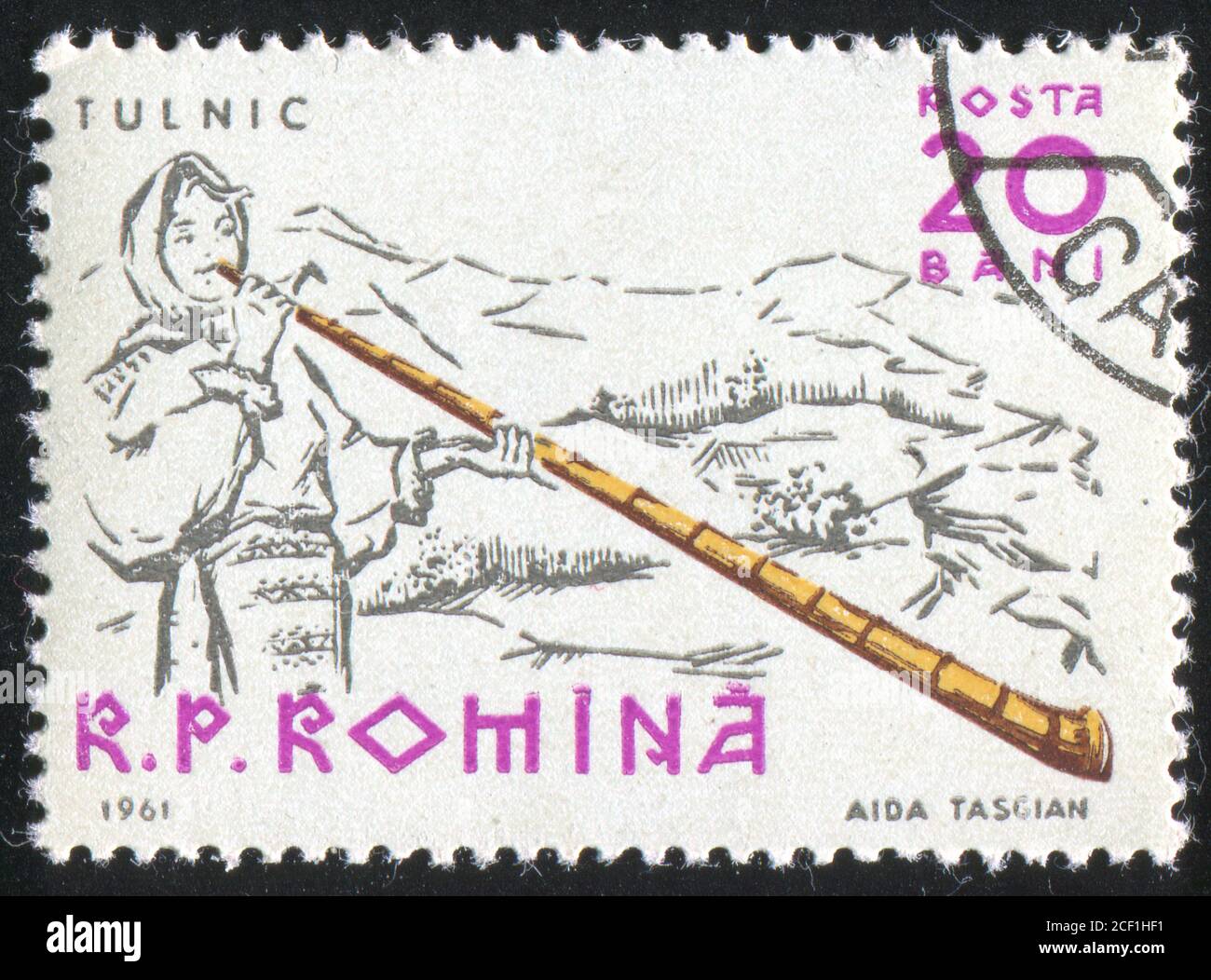 ROMANIA - CIRCA 1961: stamp printed by Romania, shows Peasants playing musical instruments, Alpenhorn, circa 1961 Stock Photo