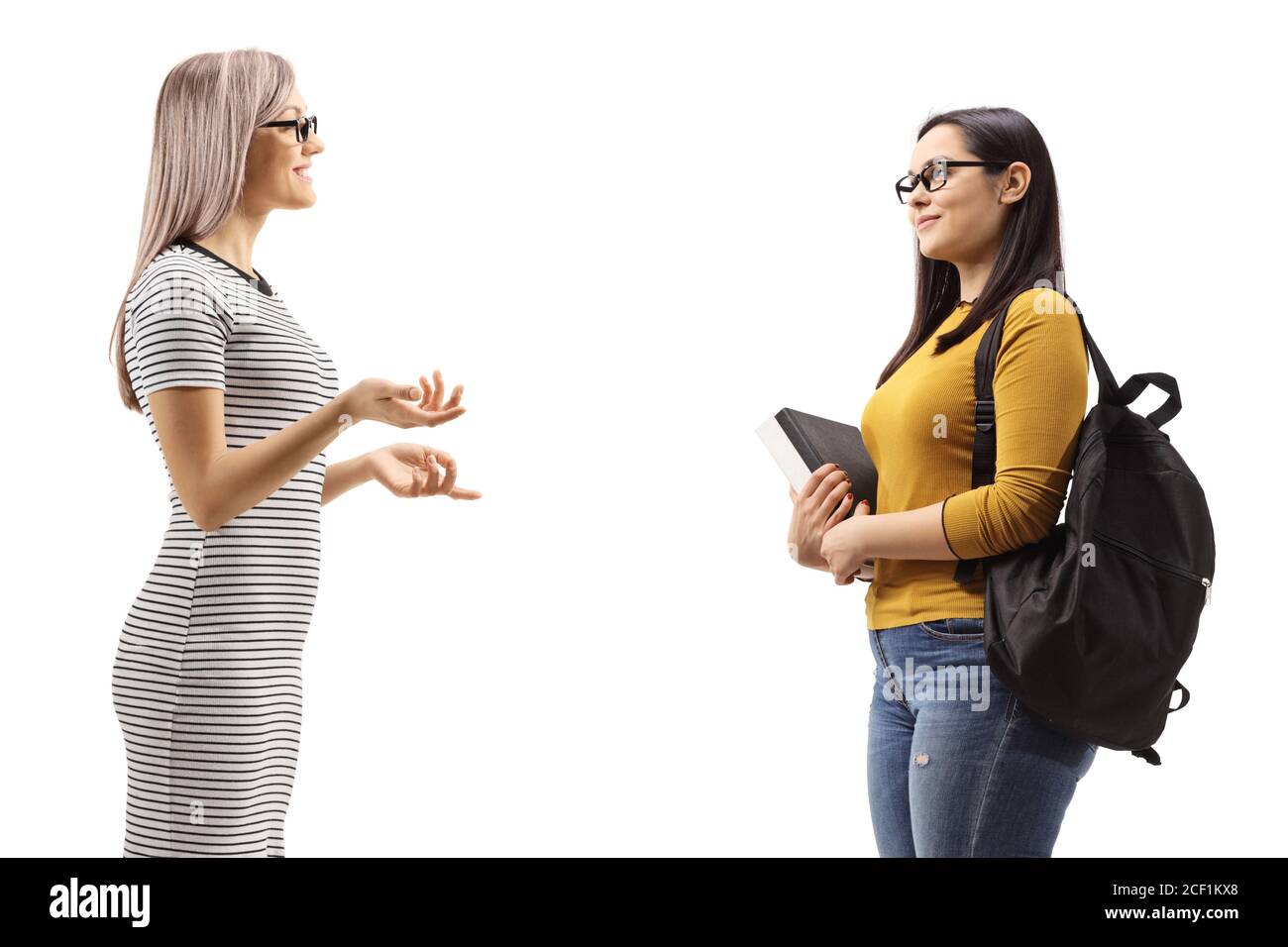 Woman talking to a female student isolated on white background Stock ...