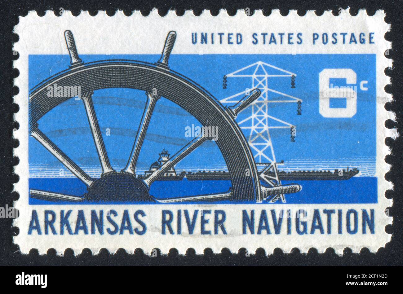 UNITED STATES - CIRCA 1968: stamp printed by United States of America, shows ship wheel, power transmission tower and barge, circa 1968 Stock Photo