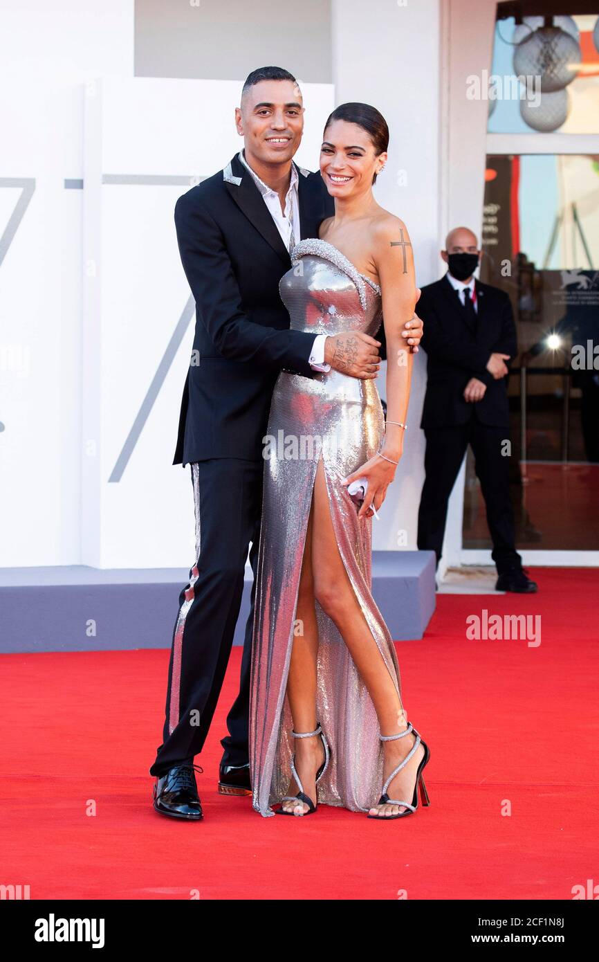 Venice, Italy. 02nd Sep, 2020. Marracash and Elodie attending the 'Lacci/The Ties' premiere and opening ceremony at the 77th Venice International Film Festival on September 2, 2020 in Venice, Italy Credit: Geisler-Fotopress GmbH/Alamy Live News Stock Photo