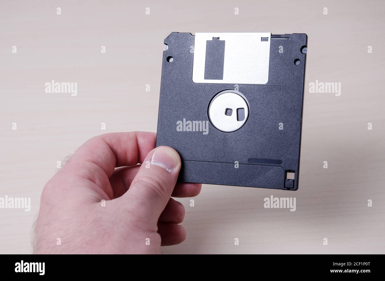 Hand holding floppy disk hires stock photography and images Alamy