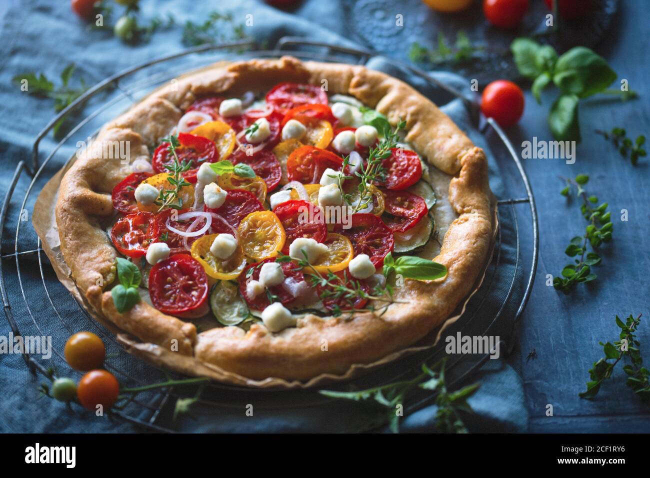 Tomato mozzarella zucchini galette Stock Photo Alamy