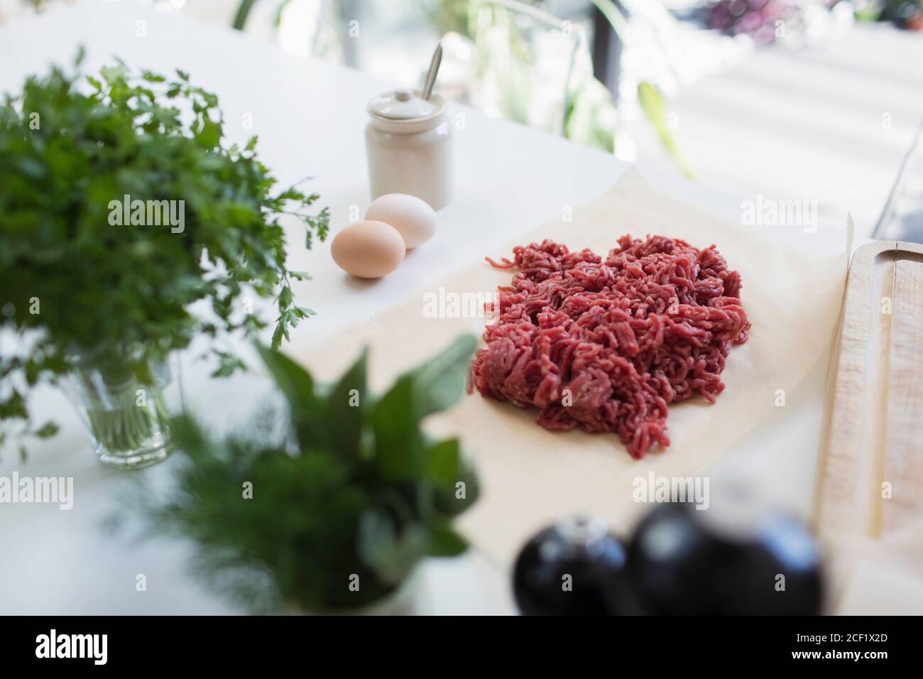 Raw ground beef and herbs Stock Photo Alamy