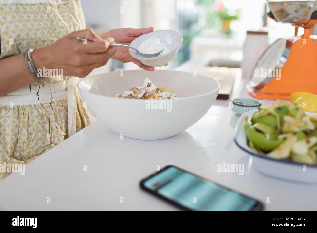 Mature woman baking alone hi-res stock photography and images - Alamy