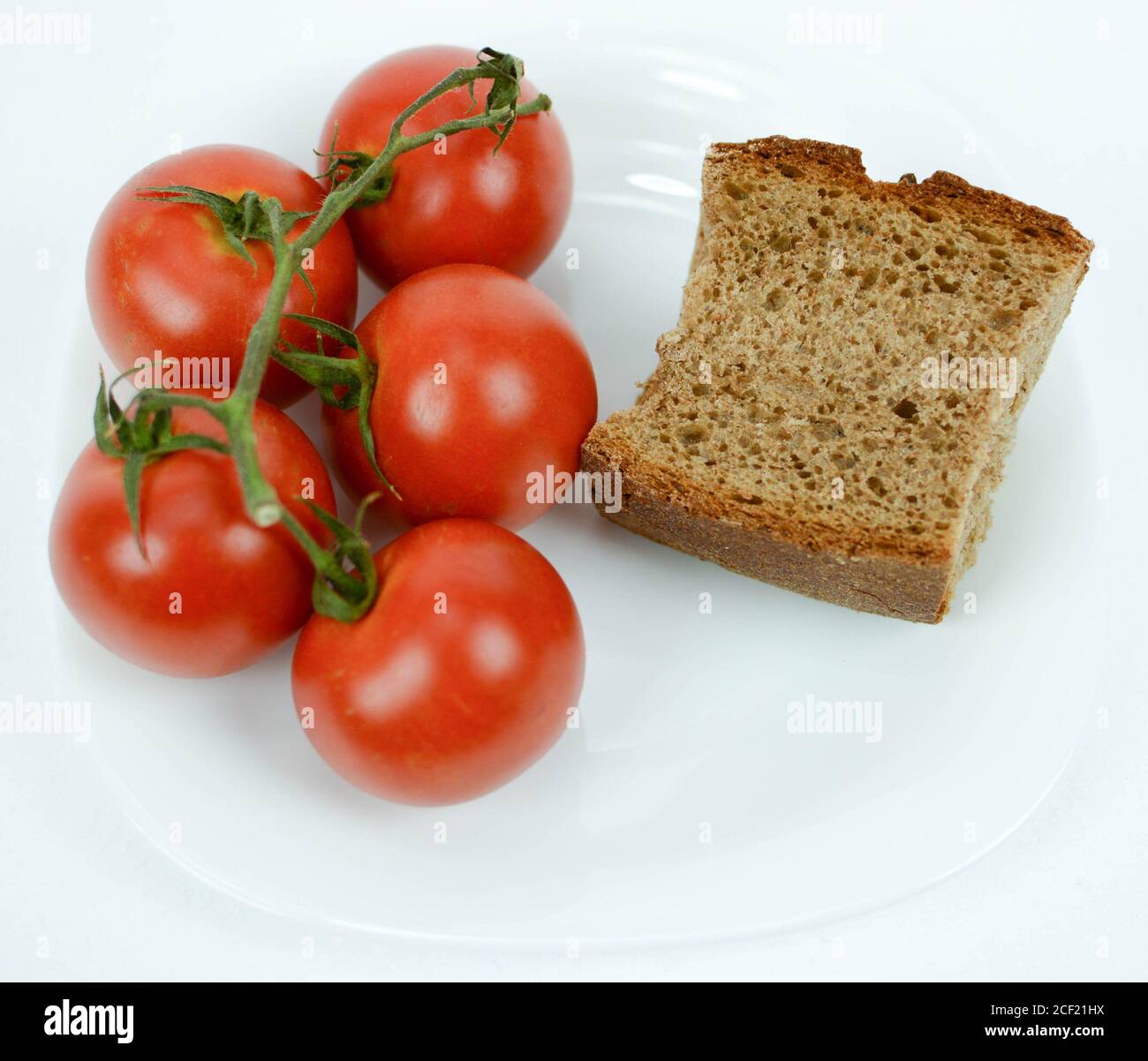 mediterranean diet brown bread and tomato Stock Photo Alamy