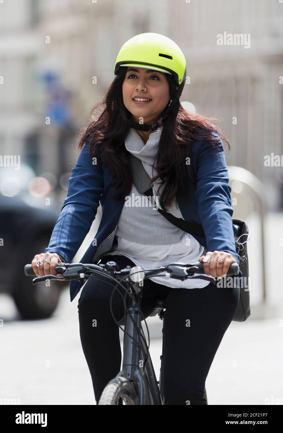 Bicycle city woman helmet hi-res stock photography and images - Alamy