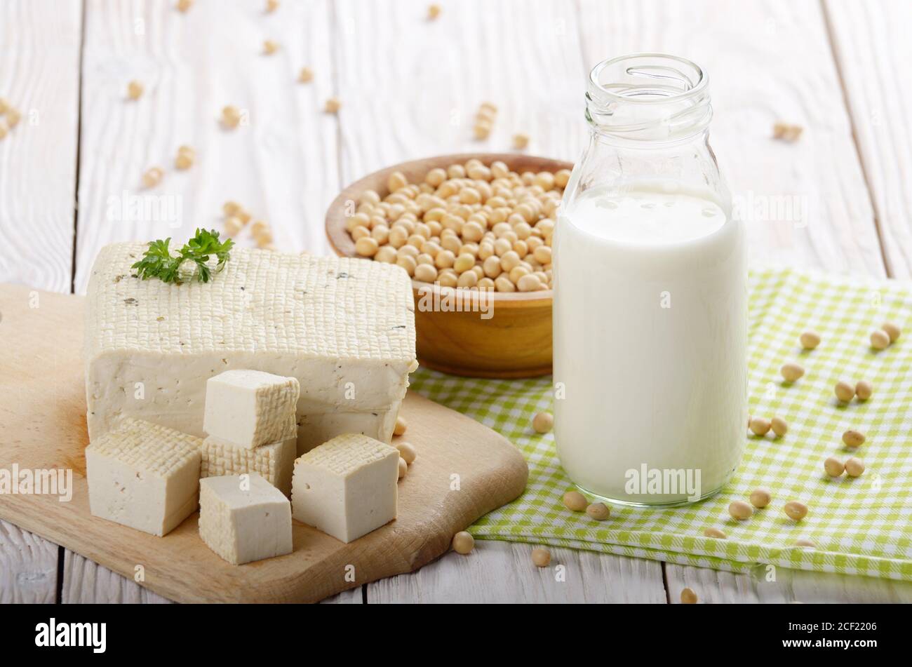 Nondairy alternatives Soy milk or yogurt in glass bottle and tofu on
