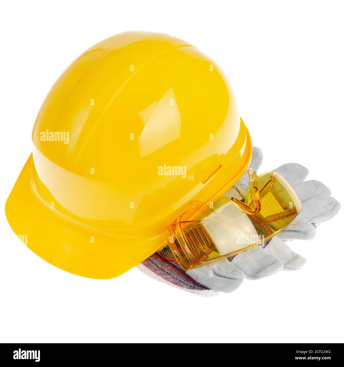 Yellow plastic hard hat glasses and protective gloves isolated on white