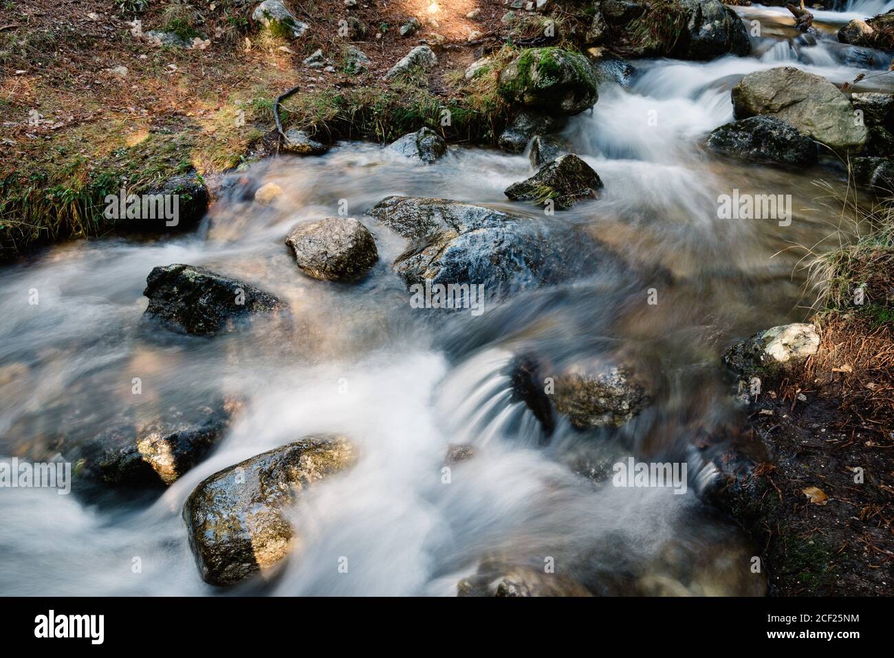 Putorana Plateau, a waterfall on the Grayling Stream. Mountain stream on a  cloudy day Stock Photo - Alamy