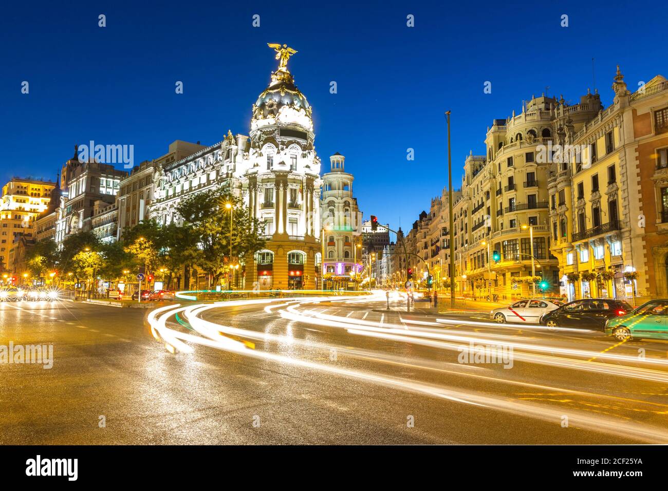 Gran Via, main shopping street in Madrid, Spain at dusk. Stock Photo