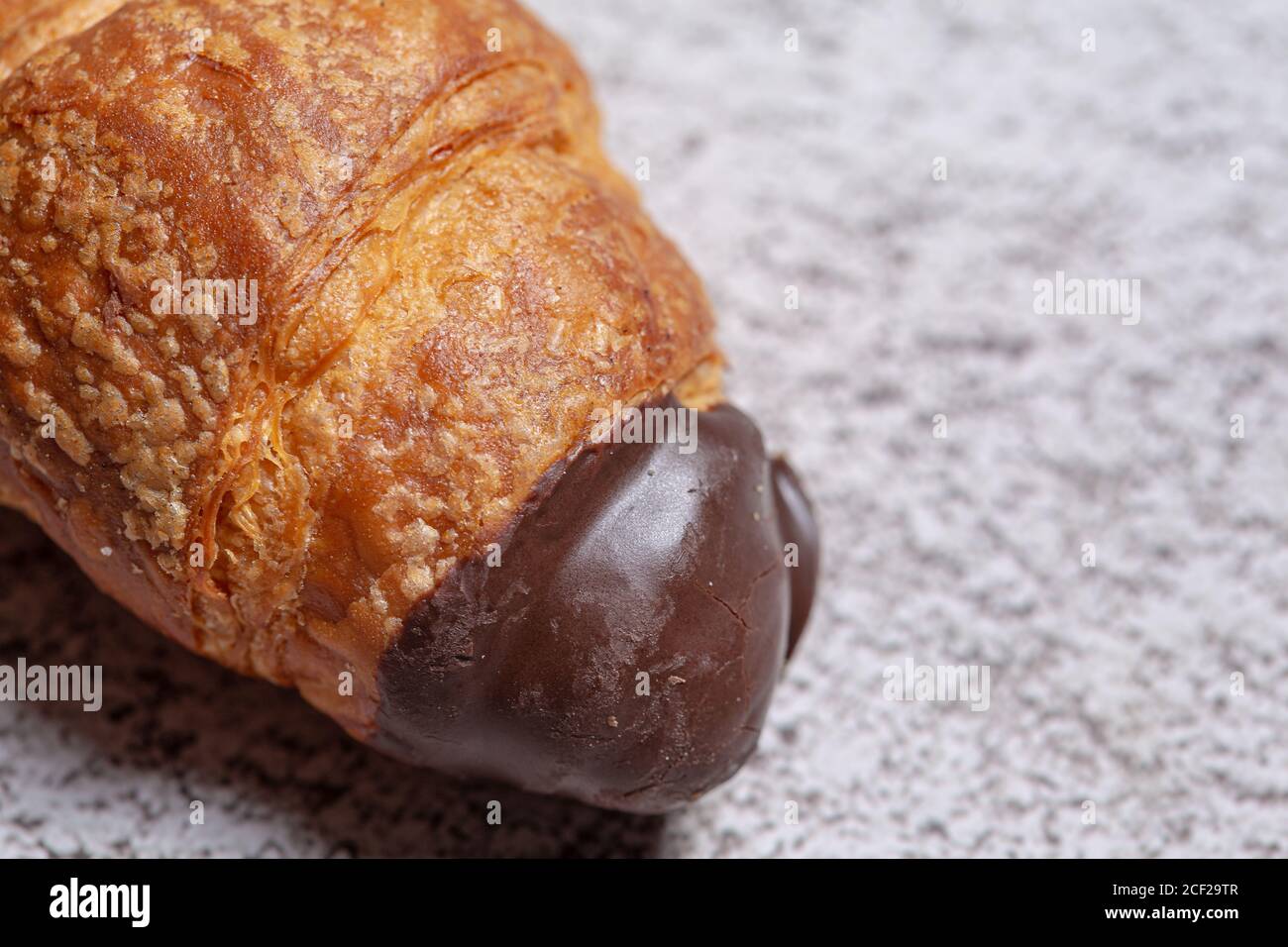 Chocolate croissant pastry close up still Stock Photo Alamy