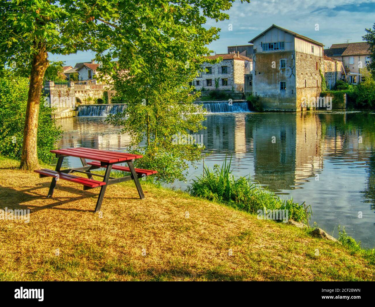 picnic table at riverside park plus old water mill and River Dropt, AllemansduDropt, Lotet