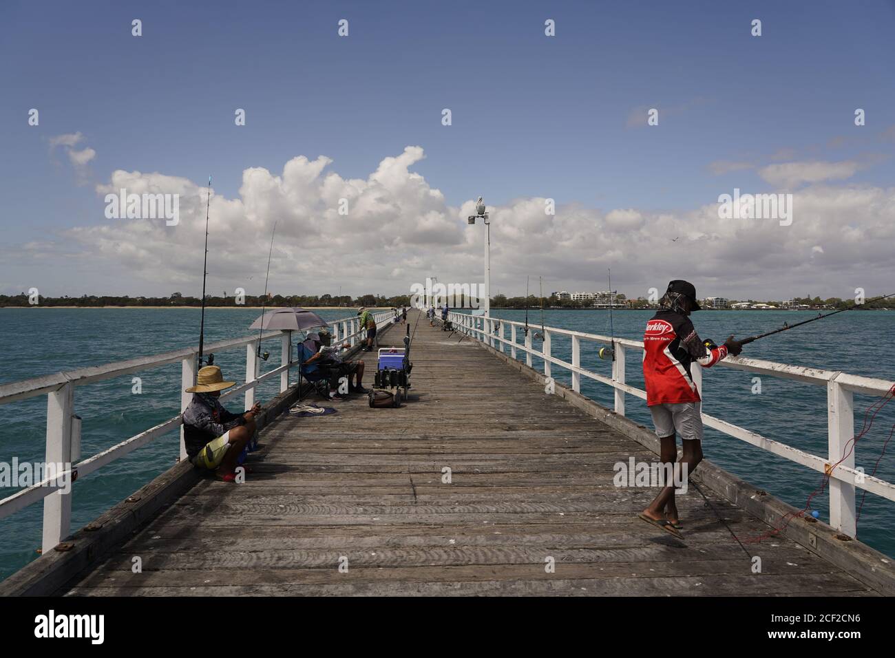 Fishing at Urangan Pier Hervey Bay, Queensland, Australia Stock Photo