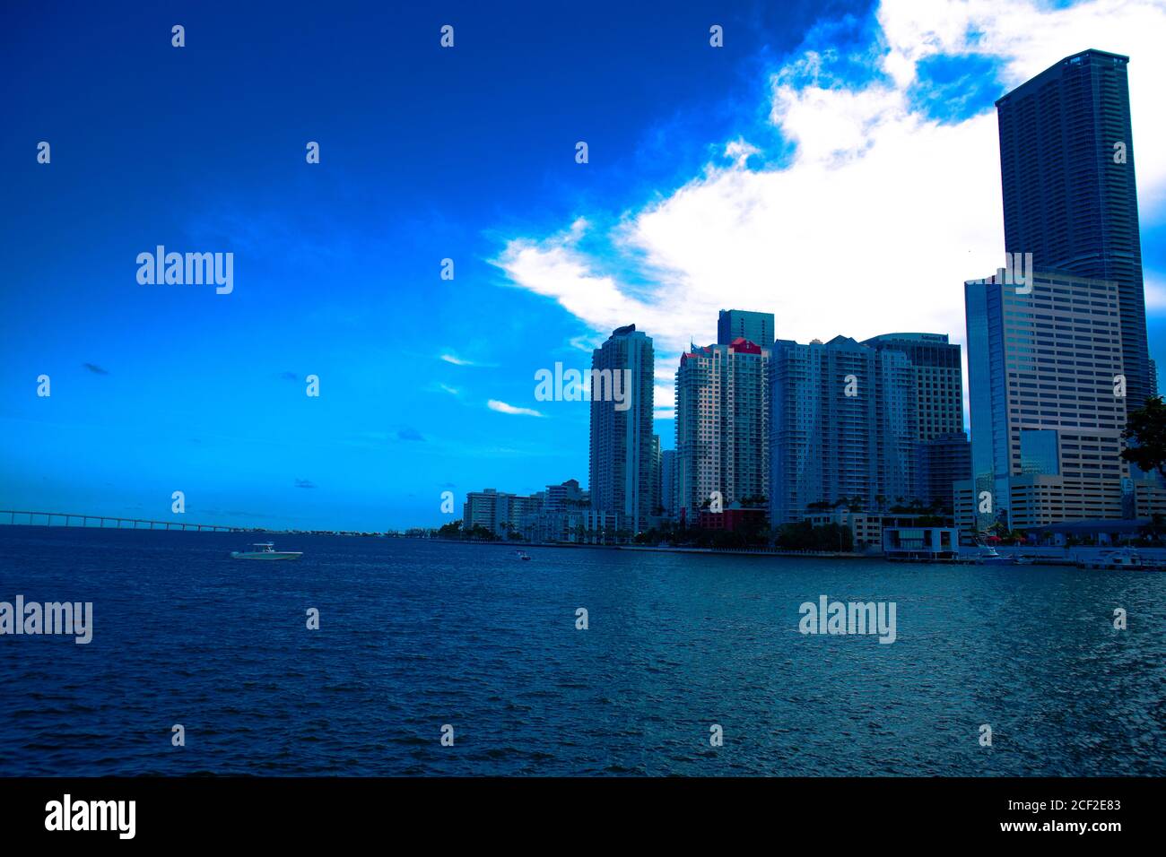 View of buildings next to the Miami South Channel in Brickell Miami, Florida with blue sky, Skyline of Brickell near the the Miami South Channel with Stock Photo