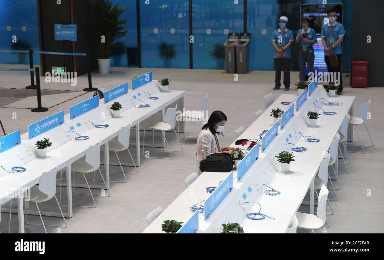 Beijing, China. 3rd Sep, 2020. A journalist works at the media center of the China International Fair for Trade in Services (CIFTIS) in Beijing, capital of China, Sept. 3, 2020. The media center of the CIFTIS started trial operation on Thursday. The CIFTIS is to be held from Sept. 4 to 9. Credit: Pan Siwei/Xinhua/Alamy Live News Stock Photo