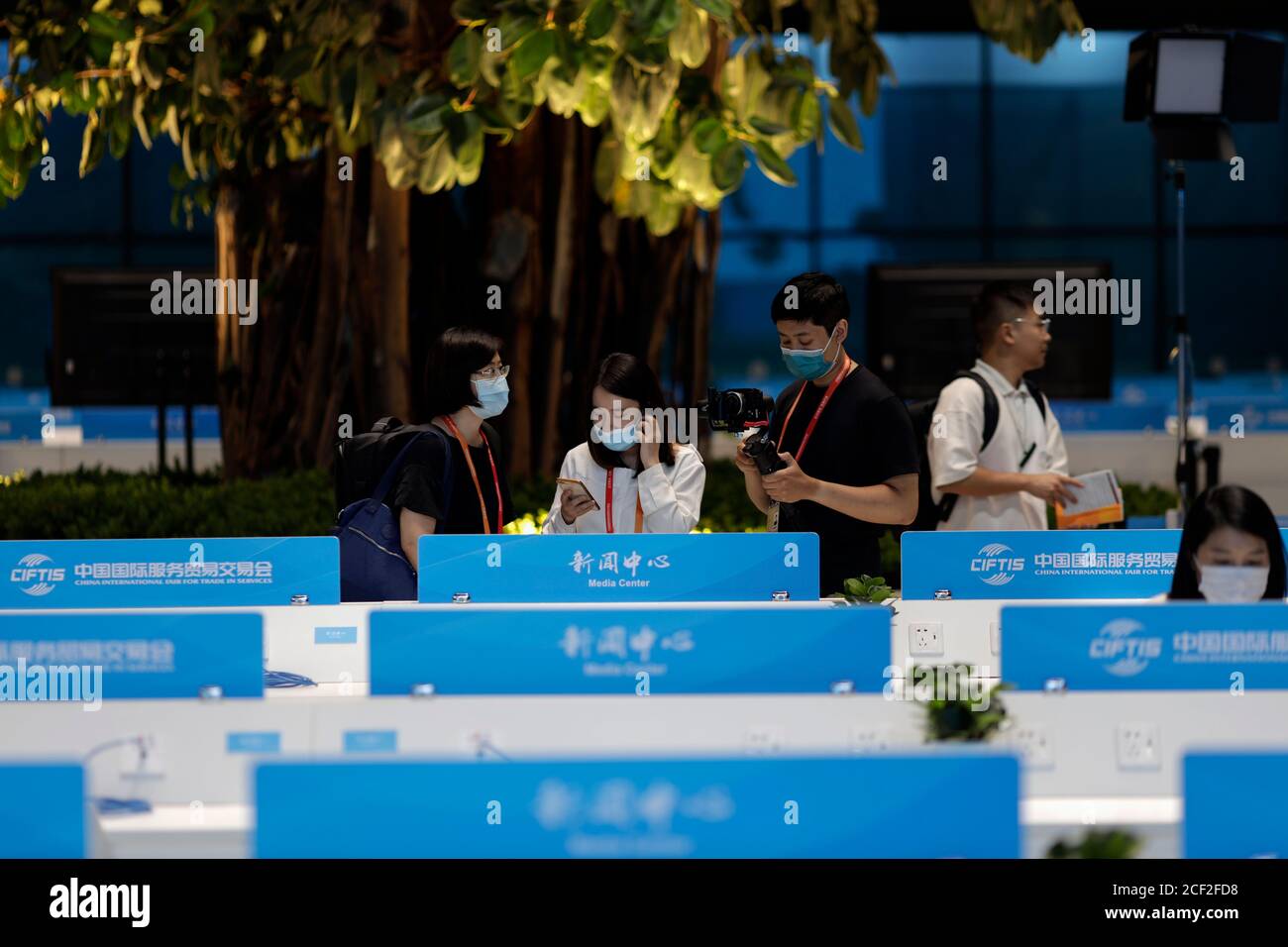 Beijing, China. 3rd Sep, 2020. Journalists work at the media center of China International Fair for Trade in Services (CIFTIS) in Beijing, capital of China, Sept. 3, 2020. The media center of the CIFTIS started trial operation on Thursday. The CIFTIS is to be held from Sept. 4 to 9. Credit: Li Muzi/Xinhua/Alamy Live News Stock Photo