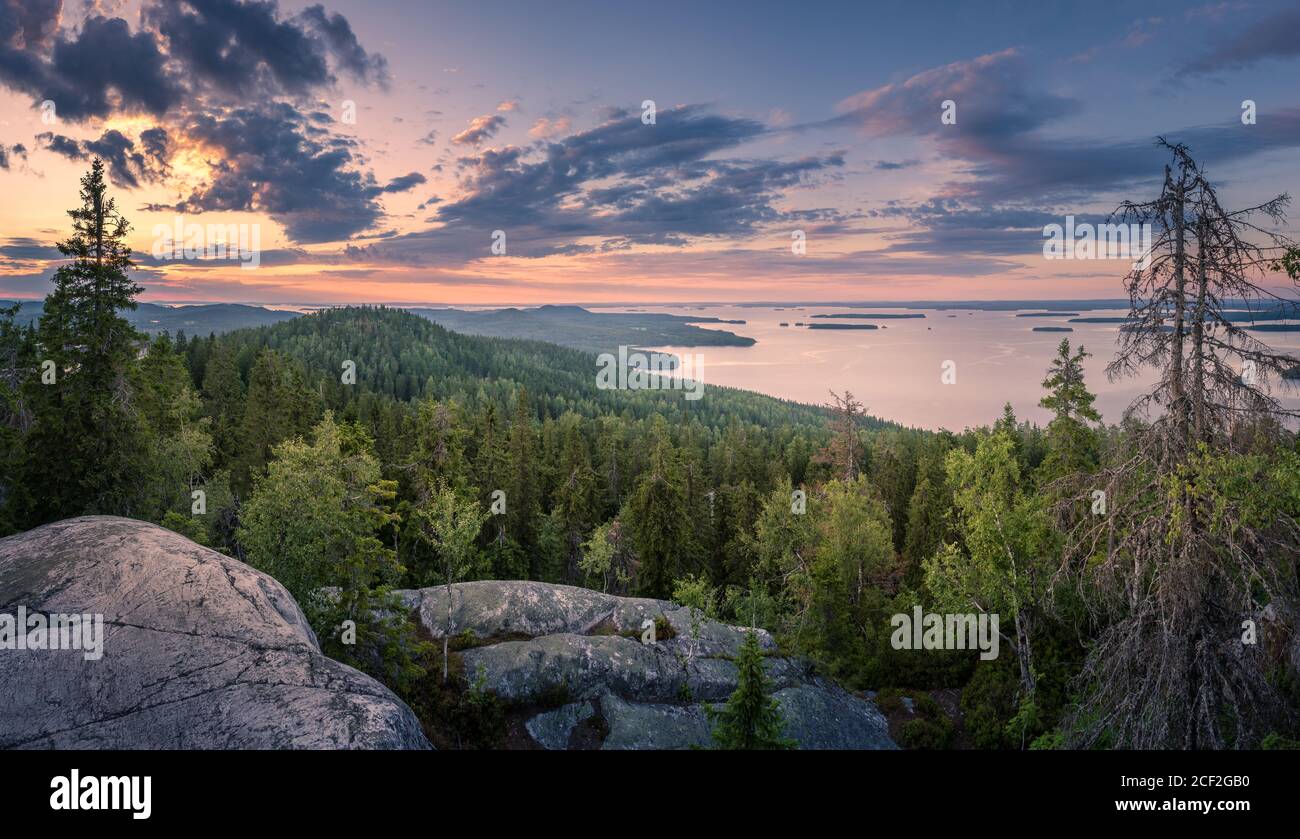 Scenic panorama landscape with lake and sunset at evening in Koli, national park, Finland Stock Photo