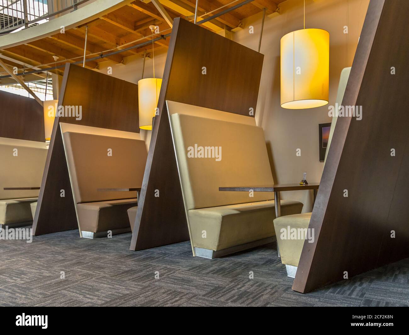 Modern restaurant booth seats in brown shades Stock Photo