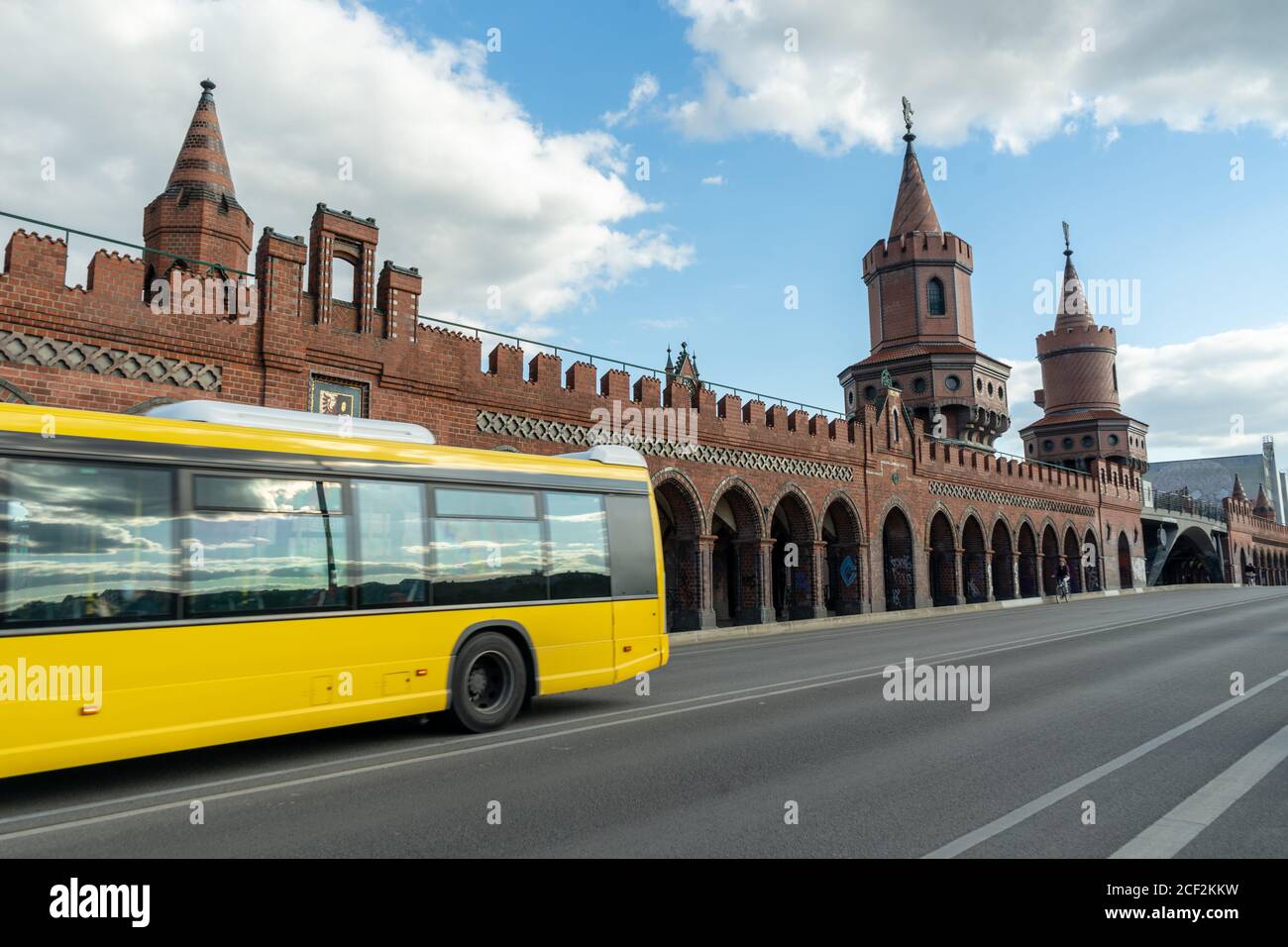 BERLIN, GERMANY - May 14, 2020: BERLIN, GERMANY May 14, 2020. The Oberbaum Bridge on the Spree with a blue sky and clouds. It connects Friedrichshain Stock Photo