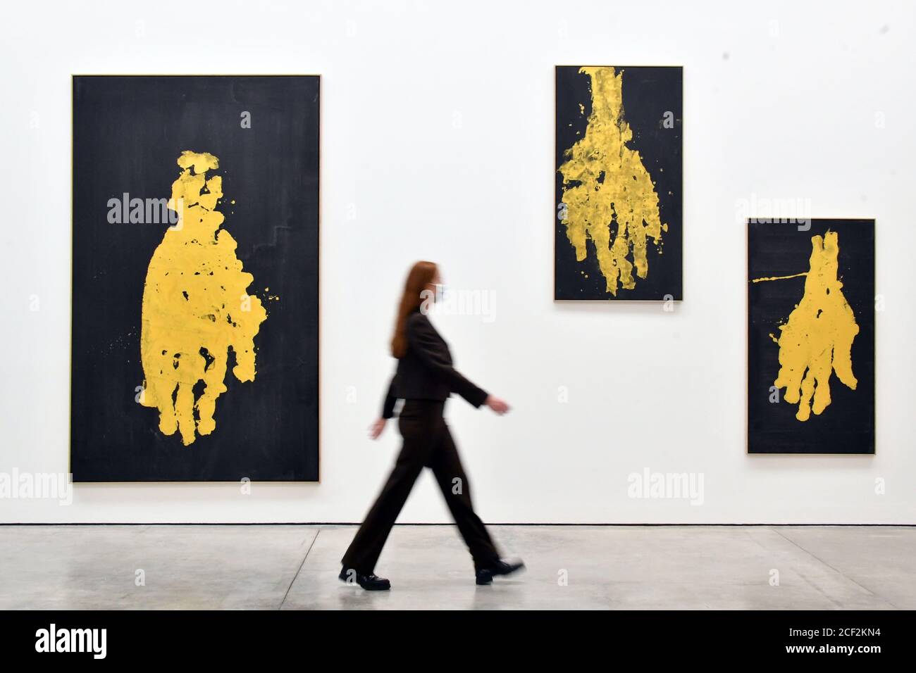 London, UK - 3 September 2020 Preview of ÔDarkness GoldnessÕ, a solo exhibition by Georg Baselitz at White Cube Mason's Yard consisting of new paintings featuring mysterious, ghostly hands rendered in gold, alongside related drawings and fire-gilded bronze reliefs, the artistÕs first sculptural works in almost a decade. (L-R) Manodopera C ArbeitskrŠfte, 2019, Per mano C an der Hand, 2019, Mano sola, 2019  Credit: Nils Jorgensen/Alamy Live News Stock Photo