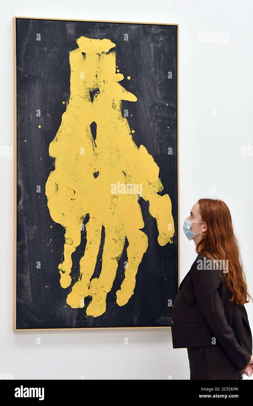 London, UK - 3 September 2020 Preview of ÔDarkness GoldnessÕ, a solo exhibition by Georg Baselitz at White Cube Mason's Yard consisting of new paintings featuring mysterious, ghostly hands rendered in gold, alongside related drawings and fire-gilded bronze reliefs, the artistÕs first sculptural works in almost a decade. Mano meno, 2019Credit: Nils Jorgensen/Alamy Live News Stock Photo