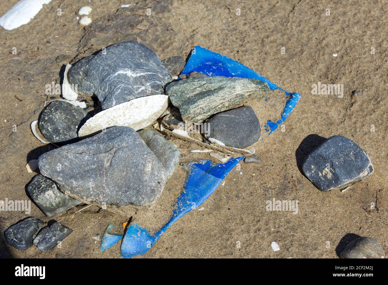 Plastic rubbish left on beaches Stock Photo