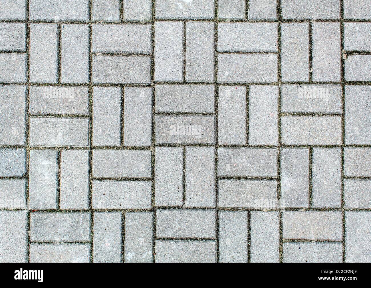 road paved with sidewalk tiles. beautiful brick background with