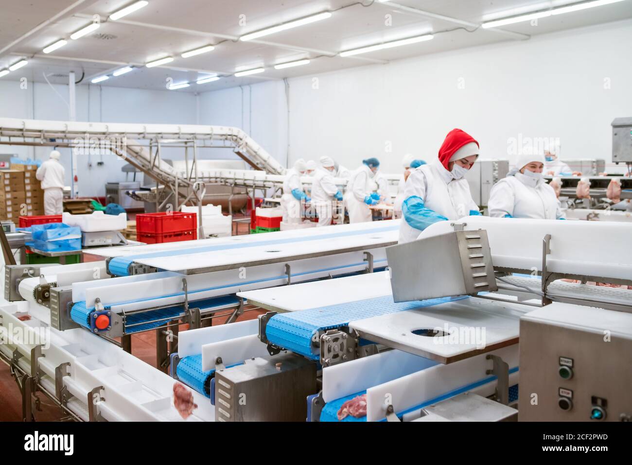 Industrial equipment at a meat factory. Meat processing plant. Meat equipment. Production line with packaging and cutting of meat Photo - Alamy