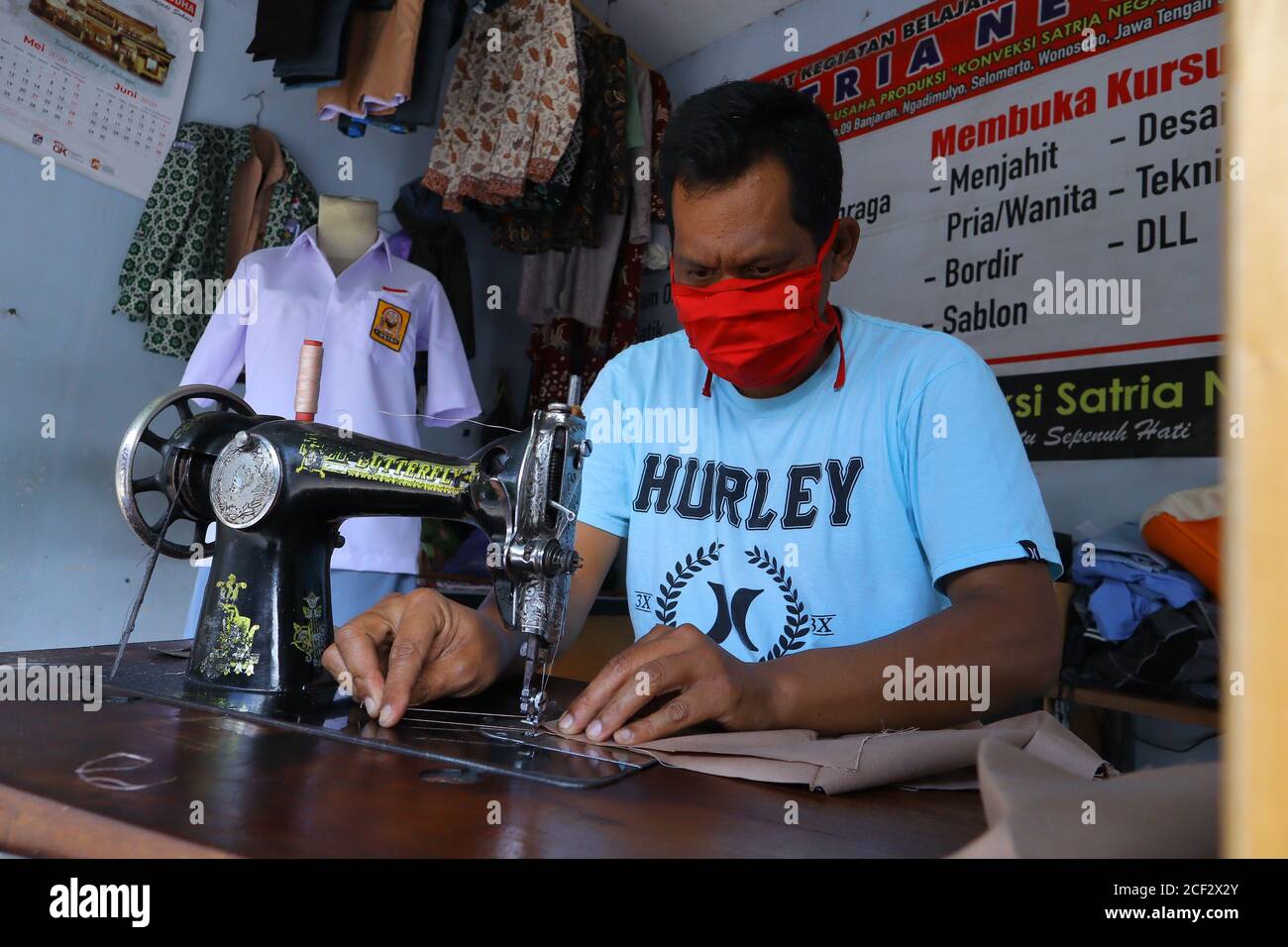 Worker wearing uniform hi-res stock photography and images - Alamy