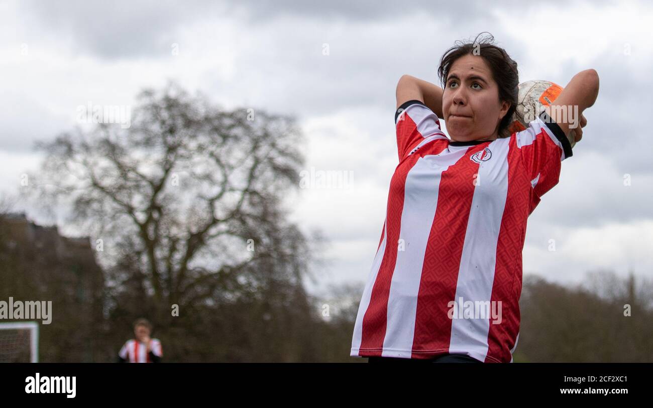 Clapton CFC Women's football player takes a throw-in. 14th March, 2020 Stock Photo