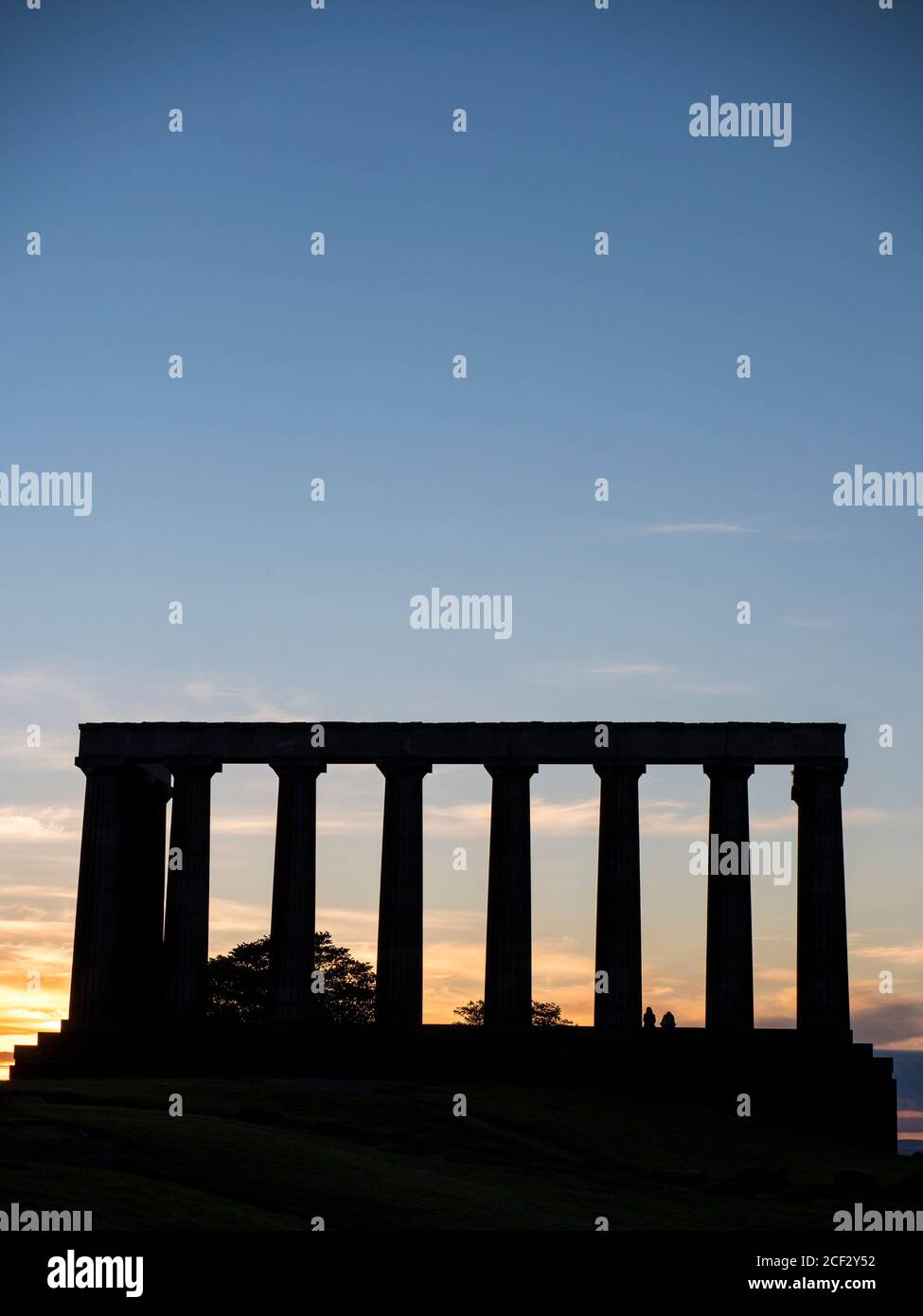 Silhouette of two Teenagers, National Monument of Scotland, Edinburgh, Scotland, UK, GB. Stock Photo