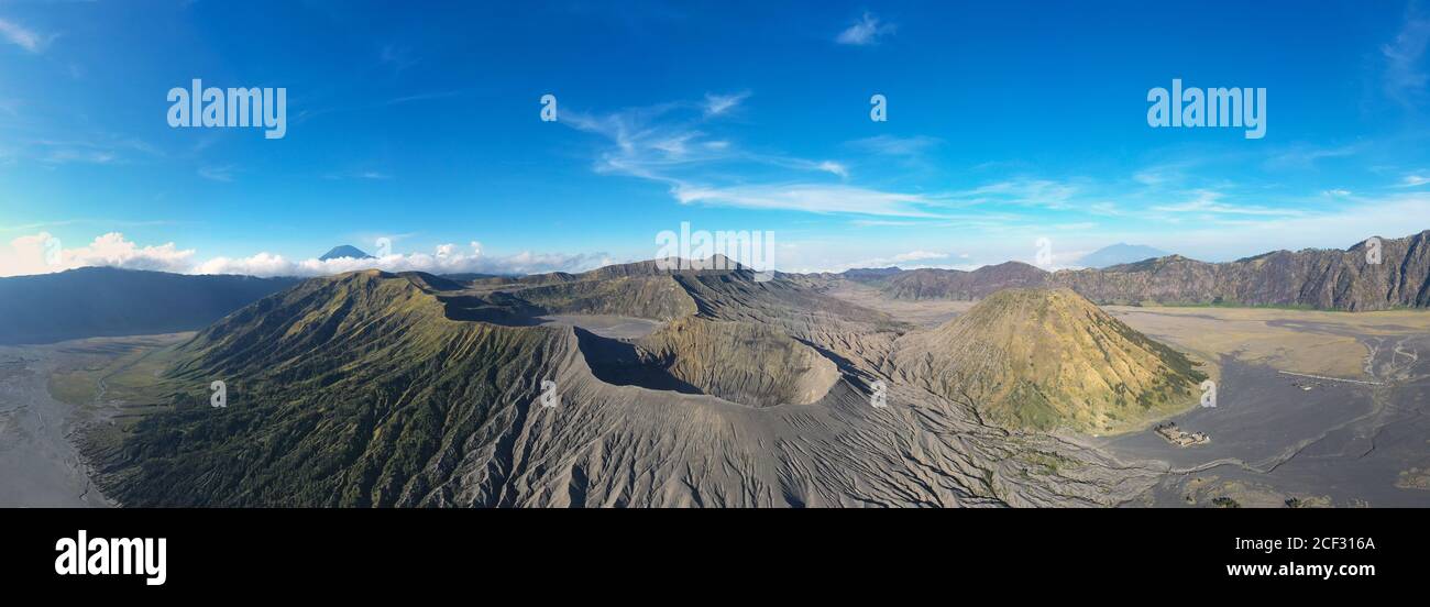 Stunning aerial view of the Mount Bromo crater illuminated during a beautiful sunny day. Mount Bromo is an active volcano in East Java, Indonesia Stock Photo