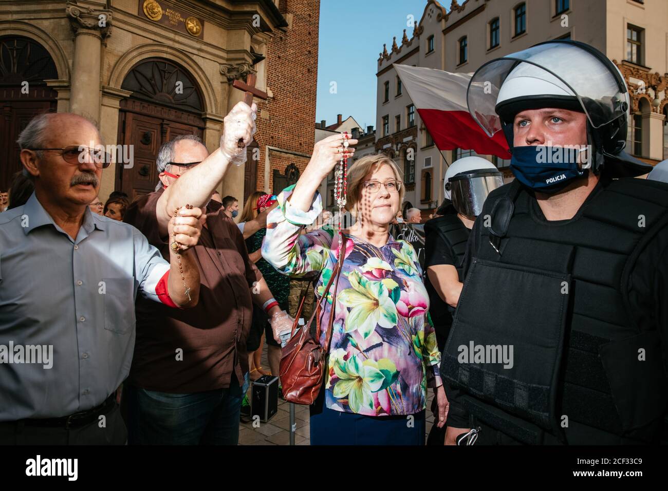 Barbara Nowak, Małopolska Region's curator of education holding a rosary seen during a counterdemonstration.  Annual Equality March also known as 'Pri Stock Photo