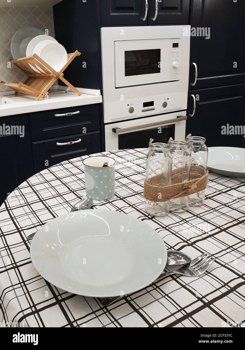 Fragment of kitchen interior with dining table Stock Photo