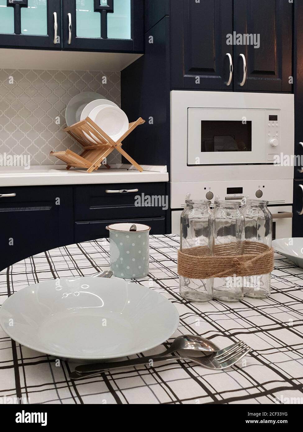 Fragment of kitchen interior with dining table Stock Photo