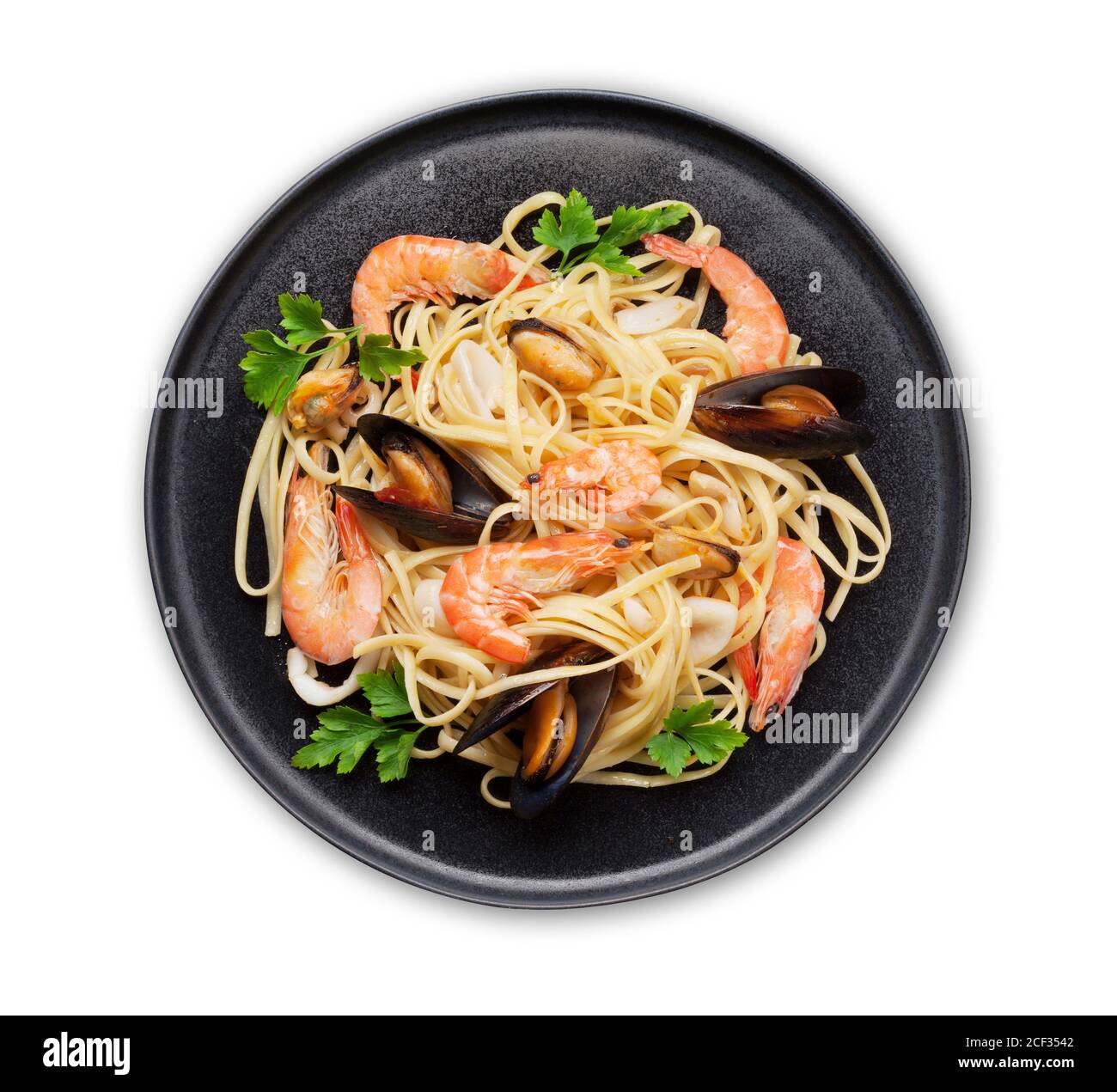 Spaghetti seafood pasta with clams and prawns. Top view flat lay