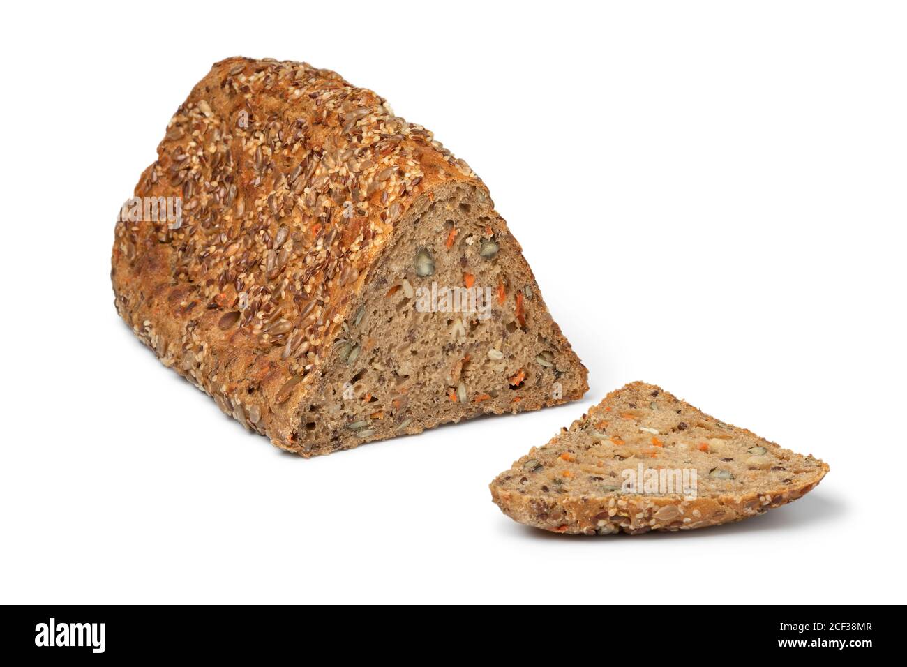 Fresh triangle loaf of German healthy rye seed bread and a slice isolated on white background Stock Photo