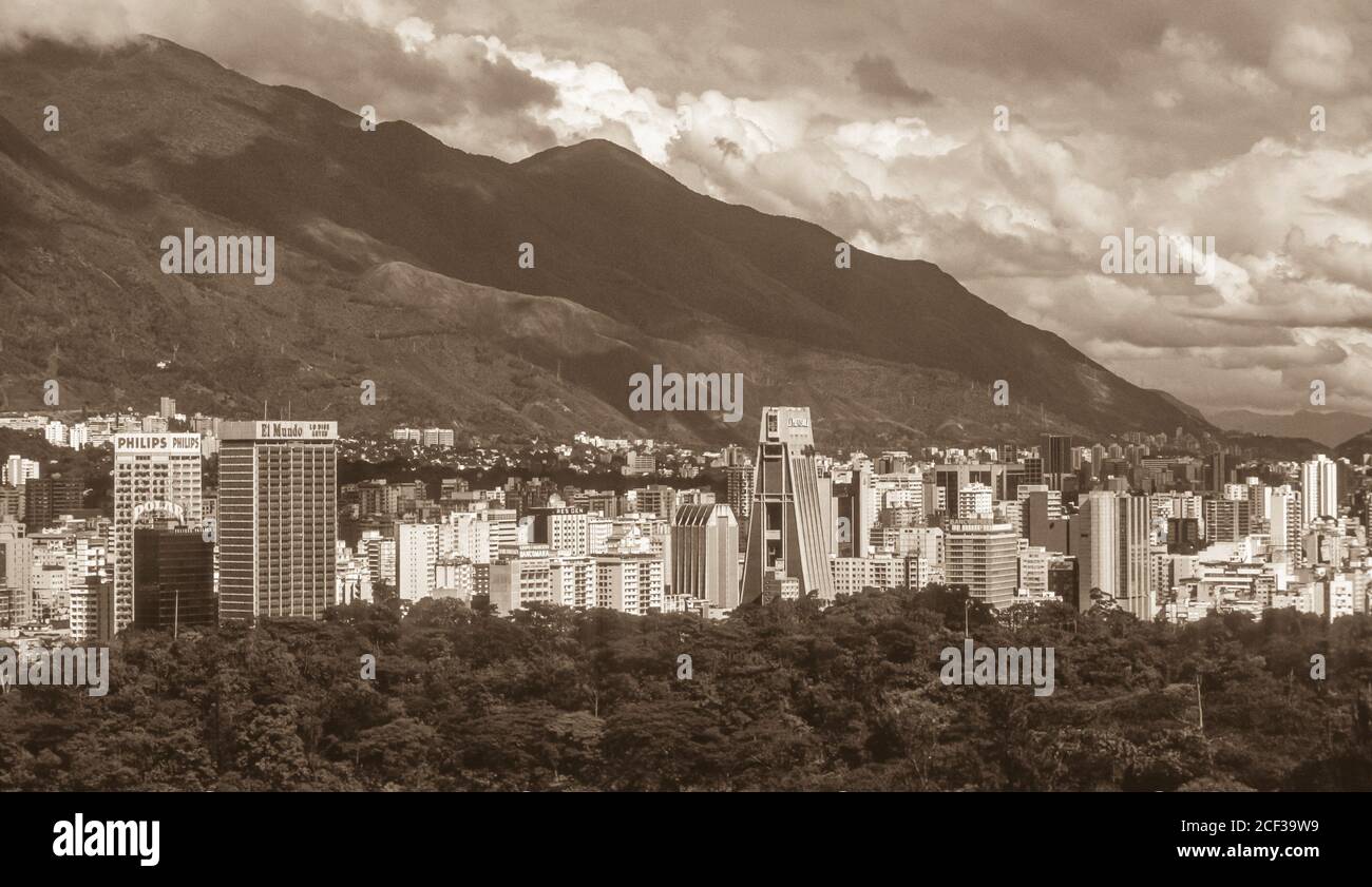 CARACAS, VENEZUELA - Tall buildings at Plaza Venezuela sector of downtown Caracas, and mountain ridge of El Avila park 1988. Stock Photo