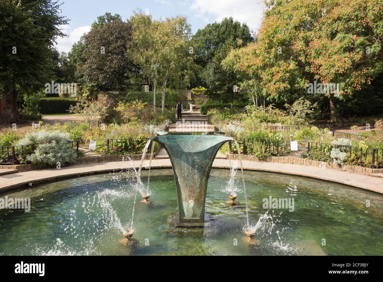 William Pye's Sibirica fountain gracing a pond in the Iris Garden, Holland Park, west London, UK. Stock Photo